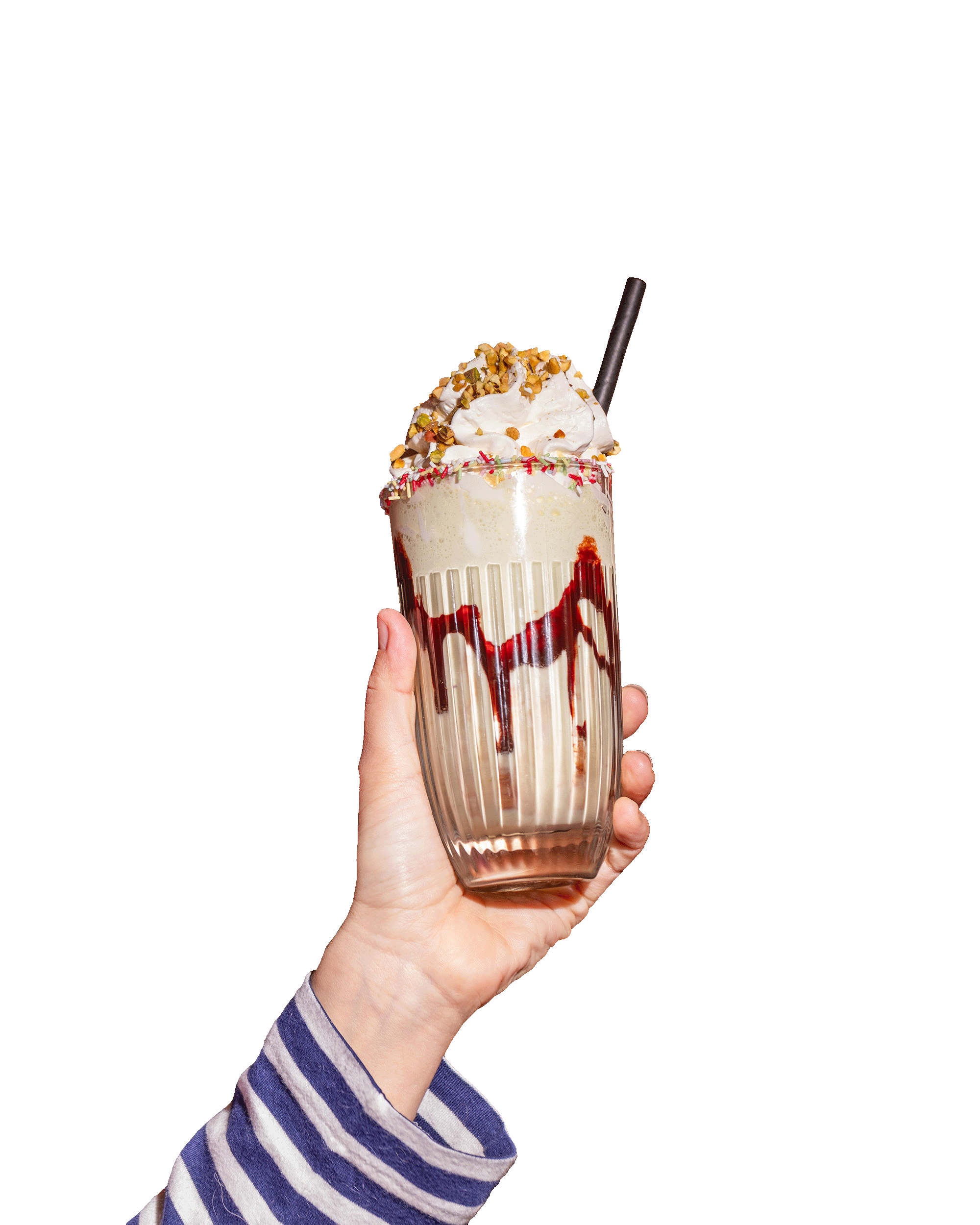 Milkshake gourmand tenu à la main